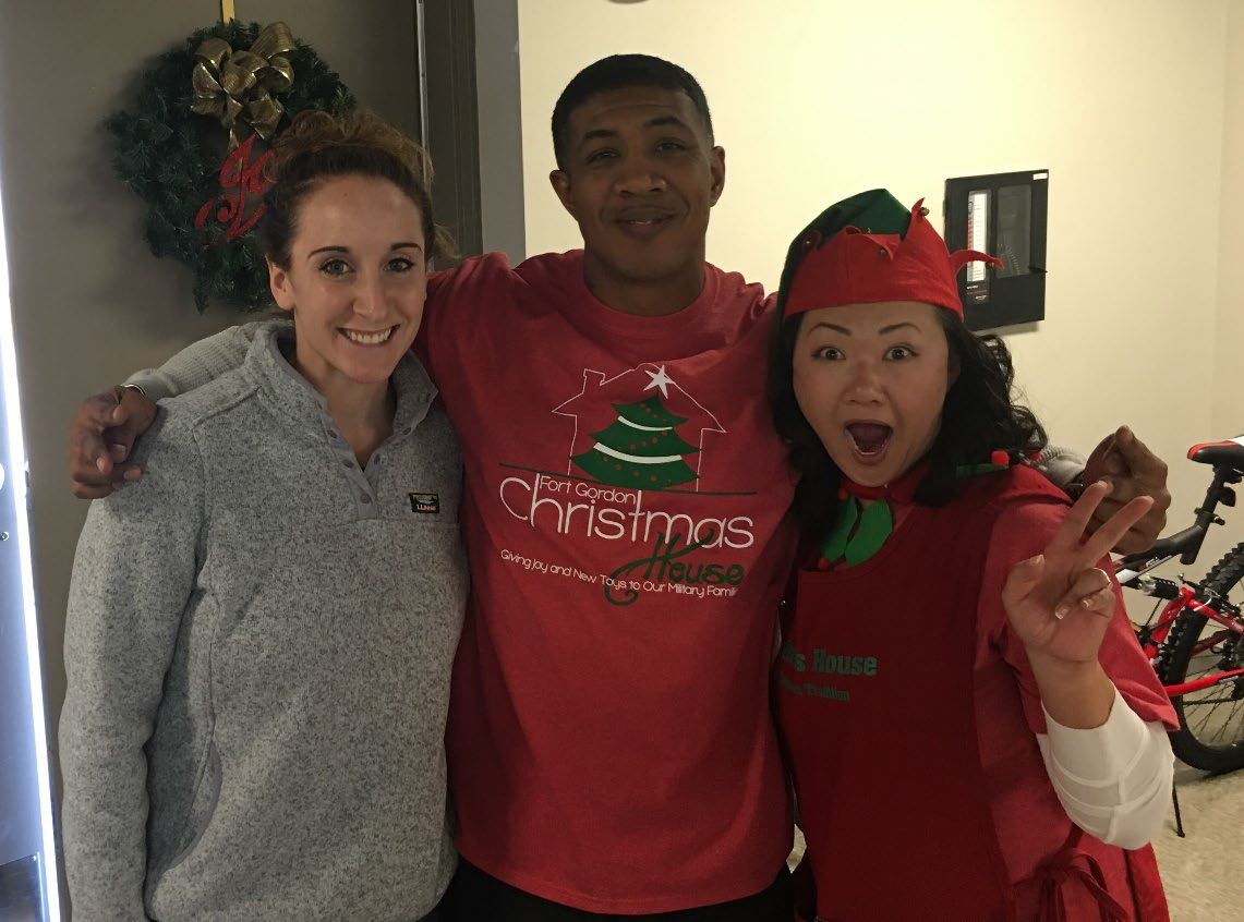 Jason volunteering at the Fort Gordon Christmas House toy drive for military families.